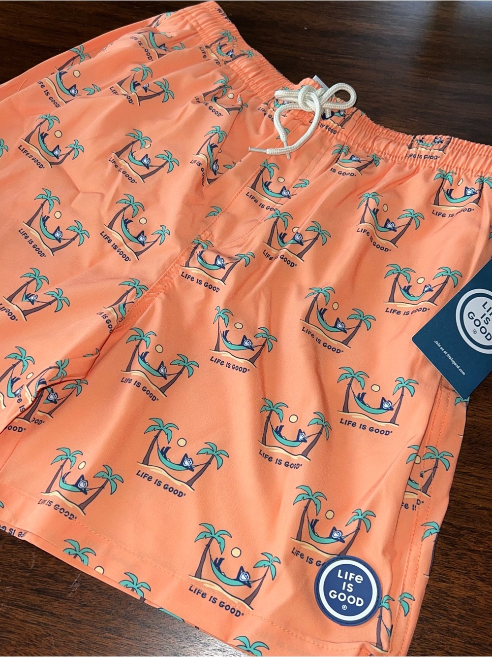 Life Is Good Men’s Orange Palm Hammock Print Swim Trunks